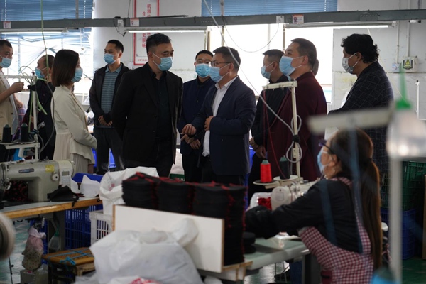 實地走訪。重慶市人力社保局供圖