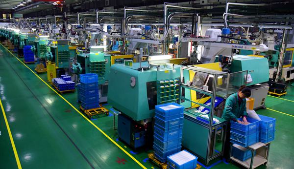 車間內機器開足馬力。萬州區委宣傳部供圖