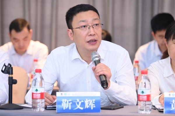 靳文輝發言。鄒樂攝