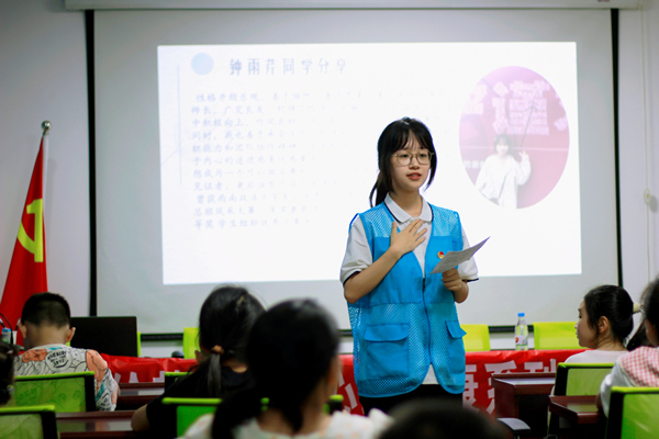 志愿者分享自身經歷。王朝攝