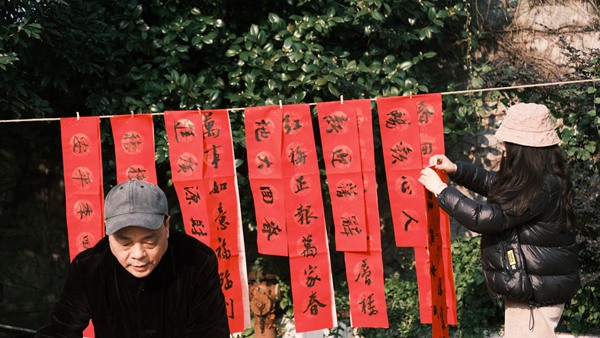 年豬節現場寫春聯。曹若琳攝